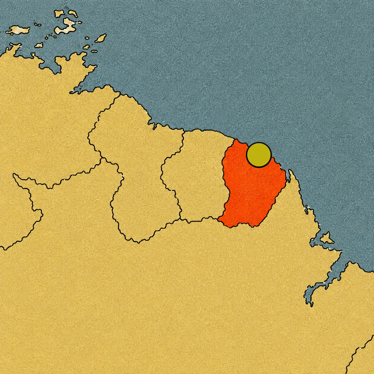 Mapa de América del Sur destacando en color rojo a la Guayana Francesa y señalando su capital, Cayena, con un punto amarillo
